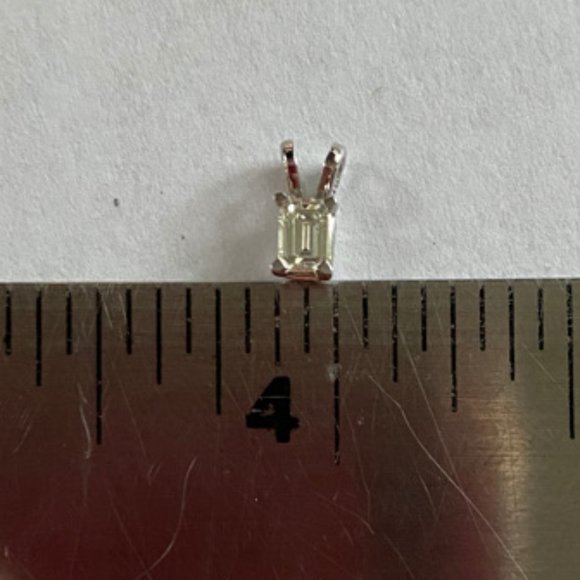 1/5 CT Emerald Cut Diamond Solitaire Pendant 14K. - Picture 5 of 12